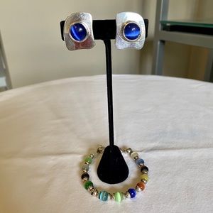 Silver and blue jewelry set.